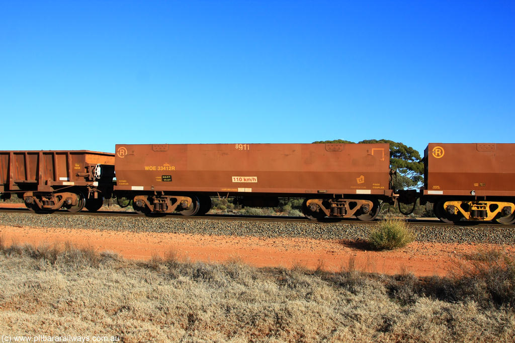 100731 02432
WOE type iron ore waggon WOE 33412 is one of a batch of one hundred and forty one built by United Group Rail WA between November 2005 and April 2006 with serial number 950142-117 and fleet number 8911 for Koolyanobbing iron ore operations, on empty train 6418 at Binduli Triangle, 31st July 2010.
Keywords: WOE-type;WOE33412;United-Group-Rail-WA;950142-117;