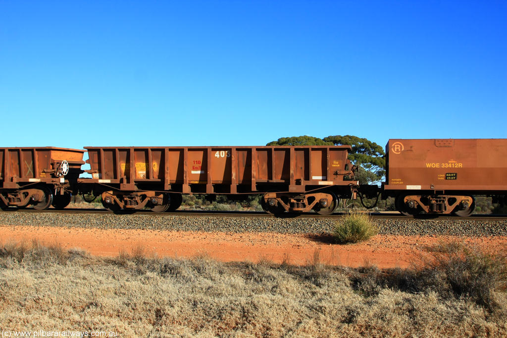 100731 02433
WOC type iron ore waggon WOC 31343 is one of a batch of thirty built by Goninan WA between October 1997 to January 1998 with fleet number 403 for Koolyanobbing iron ore operations with a 75 ton capacity, on empty train 6418 at Binduli Triangle, 31st July 2010.
Keywords: WOC-type;WOC31343;Goninan-WA;