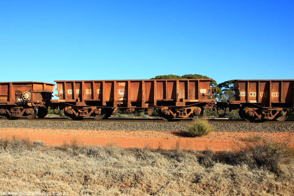 100731 02438
WO type iron ore waggon WO 31260 is one of a batch of sixty two built by Goninan WA between April and August 2000 with serial number 950086-010 and fleet number 146 for Koolyanobbing iron ore operations, and is a Goninan built replacement WO type waggon that replaces the original WAGR built WO type waggon with the newer style WOD type and has square features opposed to the curved ones as on the original WO class, on empty train 6418 at Binduli Triangle, 31st July 2010.
Keywords: WO-type;WO31260;WAGR-Midland-WS;