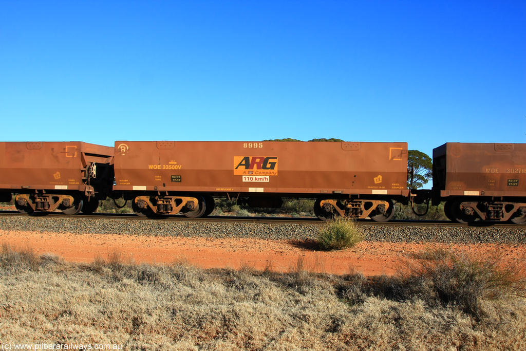 100731 02443
WOE type iron ore waggon WOE 33500 is one of a batch of one hundred and twenty eight built by United Group Rail WA between August 2008 and March 2009 with serial number 950211-040 and fleet number 8995 and ARG decal for Koolyanobbing iron ore operations, on empty train 6418 at Binduli Triangle, 31st July 2010.
Keywords: WOE-type;WOE33500;United-Group-Rail-WA;950211-040;