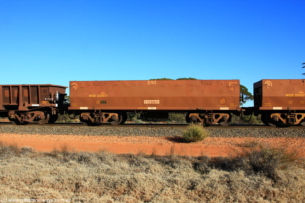 100731 02447
WOE type iron ore waggon WOE 33391 is one of a batch of one hundred and forty one built by United Group Rail WA between November 2005 and April 2006 with serial number 950142-096 and fleet number 890 for Koolyanobbing iron ore operations, on empty train 6418 at Binduli Triangle, 31st July 2010.
Keywords: WOE-type;WOE33391;United-Group-Rail-WA;950142-096;