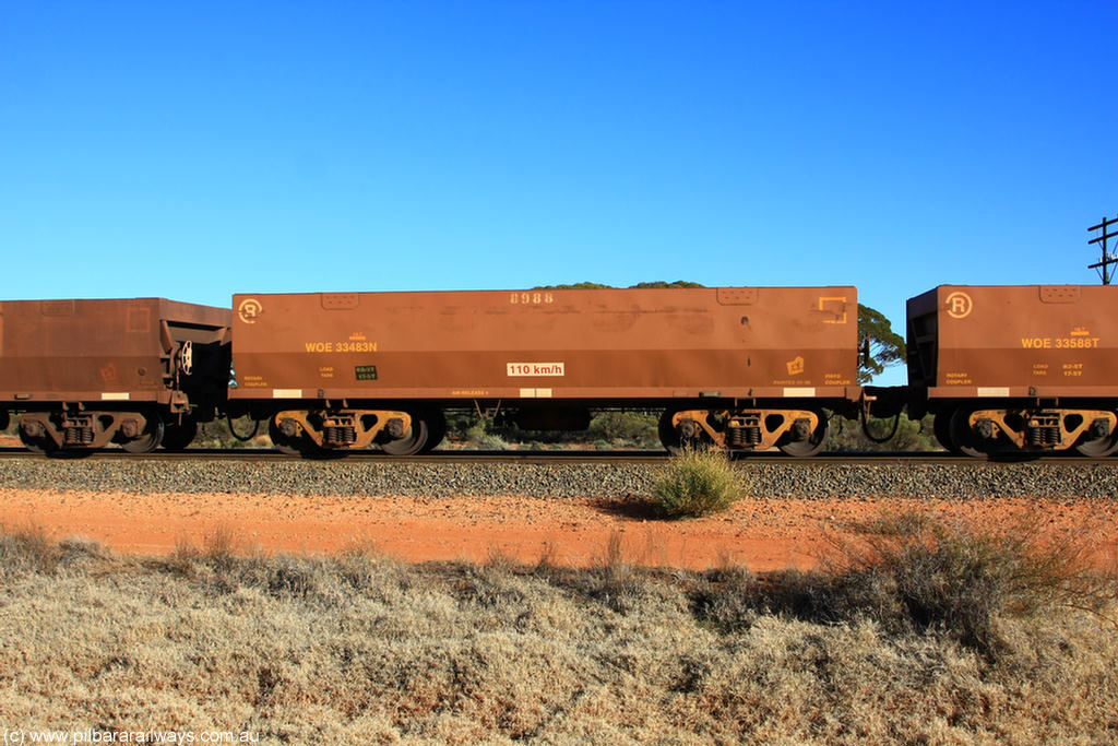 100731 02458
WOE type iron ore waggon WOE 33483 is one of a batch of one hundred and twenty eight built by United Group Rail WA between August 2008 and March 2009 with serial number 950211-??? and fleet number 8988 for Koolyanobbing iron ore operations, on empty train 6418 at Binduli Triangle, 31st July 2010.
Keywords: WOE-type;WOE33483;United-Group-Rail-WA;