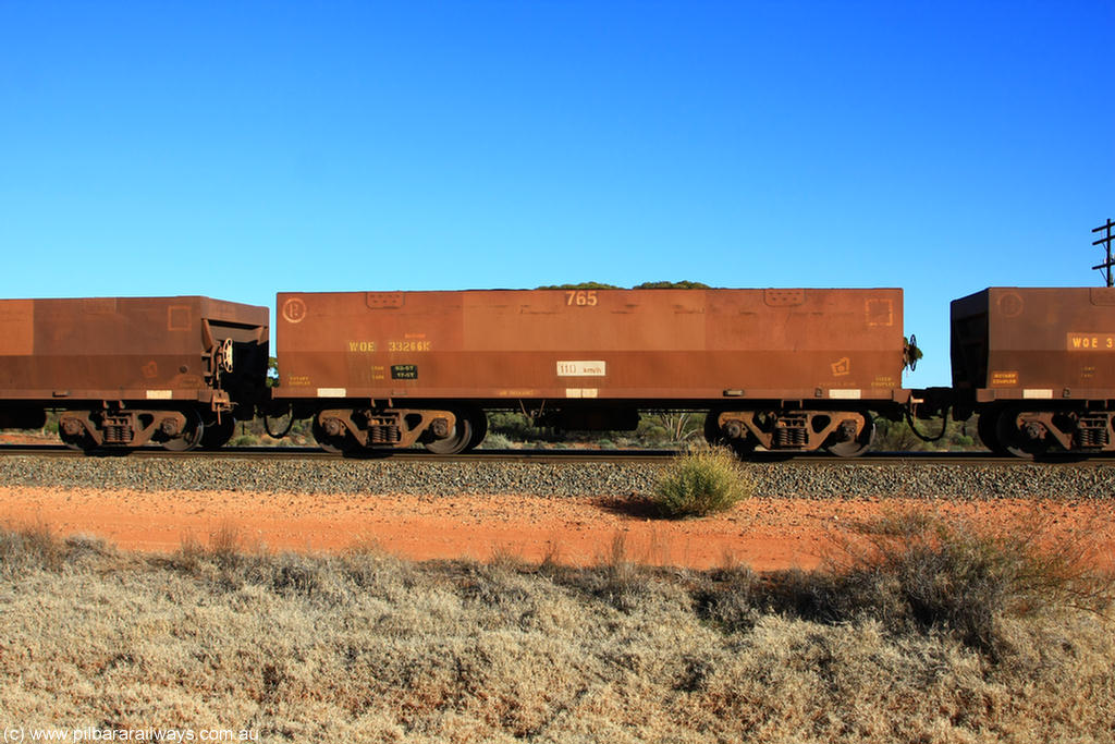 100731 02462
WOE type iron ore waggon WOE 33266 is one of a batch of thirty five built by Goninan WA between January and April 2005 with serial number 950104-006 and fleet number 765 for Koolyanobbing iron ore operations, on empty train 6418 at Binduli Triangle, 31st July 2010.
Keywords: WOE-type;WOE33266;Goninan-WA;950104-006;