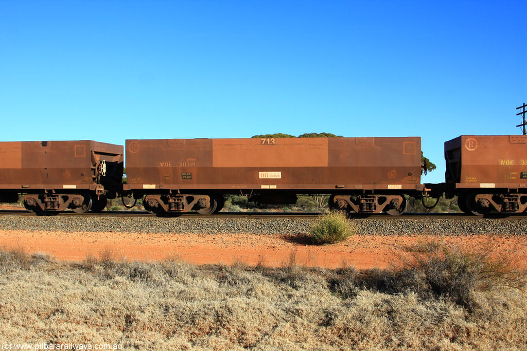 100731 02463
WOE type iron ore waggon WOE 31131 is one of a batch of one hundred and thirty built by Goninan WA between March and August 2001 with serial number 950092-121 and fleet number 713 for Koolyanobbing iron ore operations, on empty train 6418 at Binduli Triangle, 31st July 2010.
Keywords: WOE-type;WOE31131;Goninan-WA;950092-121;