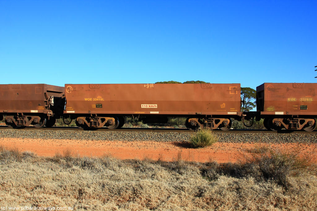 100731 02470
WOE type iron ore waggon WOE 33419 is one of a batch of one hundred and forty one built by United Group Rail WA between November 2005 and April 2006 with serial number 950142-124 and fleet number 8918 for Koolyanobbing iron ore operations, on empty train 6418 at Binduli Triangle, 31st July 2010.
Keywords: WOE-type;WOE33419;United-Group-Rail-WA;950142-124;