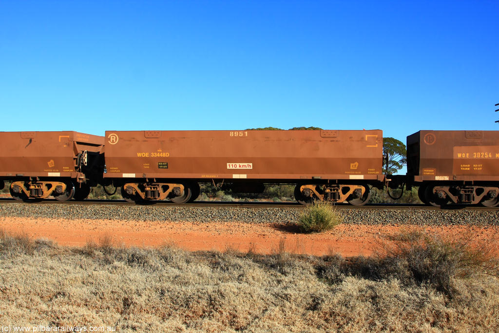 100731 02472
WOE type iron ore waggon WOE 33448 is one of a batch of seventeen built by United Group Rail WA between July and August 2008 with serial number 950209-012 and fleet number 8951 for Koolyanobbing iron ore operations, on empty train 6418 at Binduli Triangle, 31st July 2010.
Keywords: WOE-type;WOE33448;United-Group-Rail-WA;950209-012;