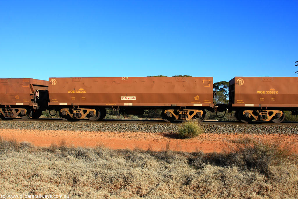 100731 02474
WOE type iron ore waggon WOE 33529 is one of a batch of one hundred and twenty eight built by United Group Rail WA between August 2008 and March 2009 with serial number 950211-069 and fleet number 9017 for Koolyanobbing iron ore operations, on empty train 6418 at Binduli Triangle, 31st July 2010.
Keywords: WOE-type;WOE33529;United-Group-Rail-WA;950211-069;