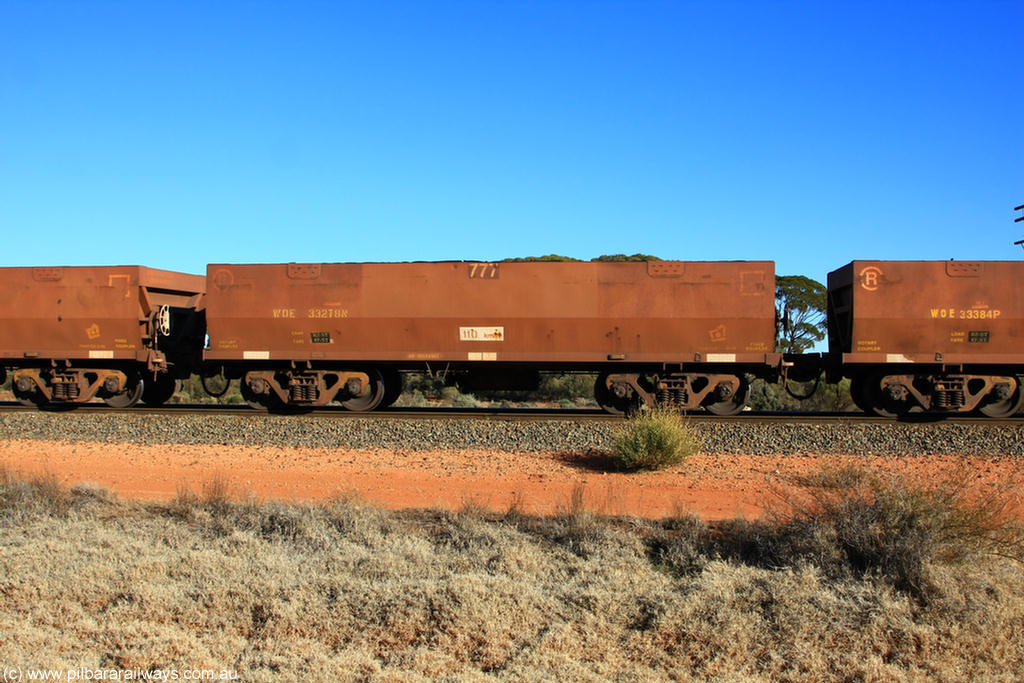 100731 02476
WOE type iron ore waggon WOE 33278 is one of a batch of thirty five built by Goninan WA between January and April 2005 with serial number 950104-018 and fleet number 777 for Koolyanobbing iron ore operations, on empty train 6418 at Binduli Triangle, 31st July 2010.
Keywords: WOE-type;WOE33278;Goninan-WA;950104-018;
