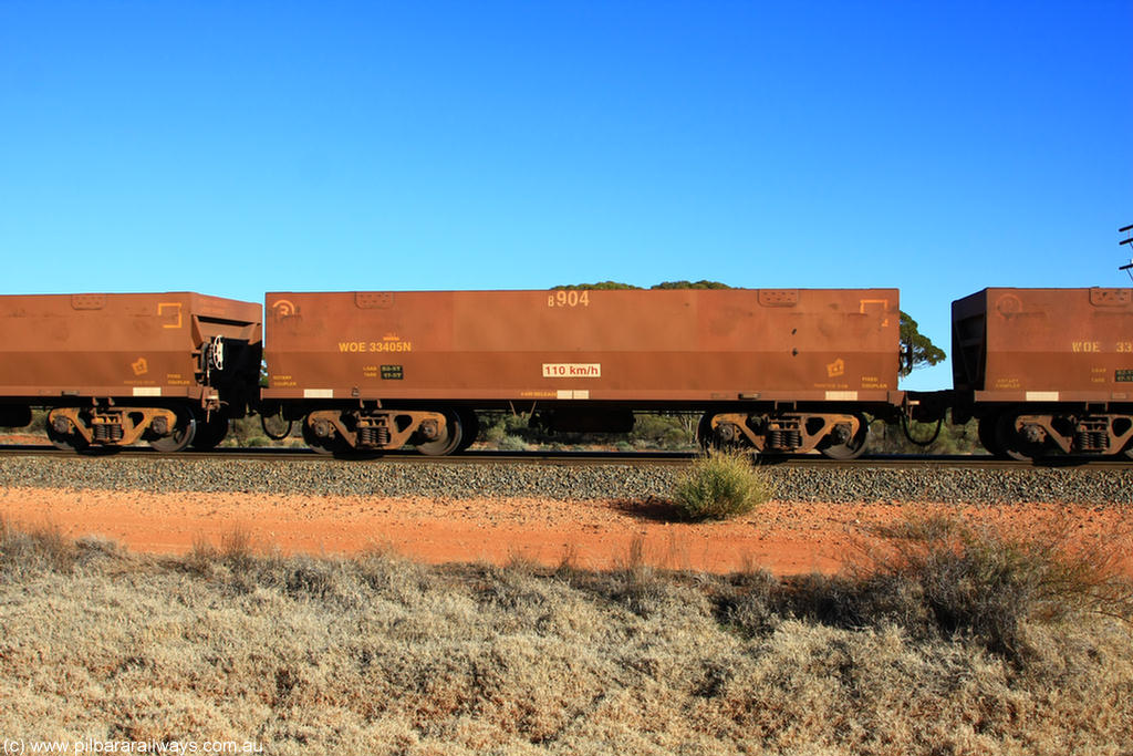 100731 02477
WOE type iron ore waggon WOE 33405 is one of a batch of one hundred and forty one built by United Group Rail WA between November 2005 and April 2006 with serial number 950142-110 and fleet number 8904 for Koolyanobbing iron ore operations, on empty train 6418 at Binduli Triangle, 31st July 2010.
Keywords: WOE-type;WOE33405;United-Group-Rail-WA;950142-110;