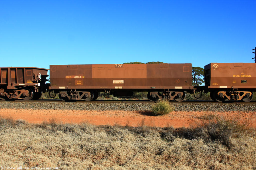 100731 02479
WOE type iron ore waggon WOE 31144 is one of a batch of fifteen built by Goninan WA between April and May 2002 with fleet number 726 for Koolyanobbing iron ore operations, on empty train 6418 at Binduli Triangle, 31st July 2010.
Keywords: WOE-type;WOE31144;Goninan-WA;