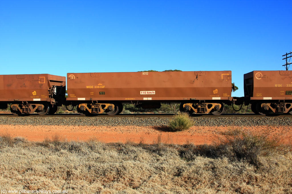 100731 02484
WOE type iron ore waggon WOE 33515 is one of a batch of one hundred and twenty eight built by United Group Rail WA between August 2008 and March 2009 with serial number 950211-055 and fleet number 9012 for Koolyanobbing iron ore operations, on empty train 6418 at Binduli Triangle, 31st July 2010.
Keywords: WOE-type;WOE33515;United-Group-Rail-WA;950211-055;