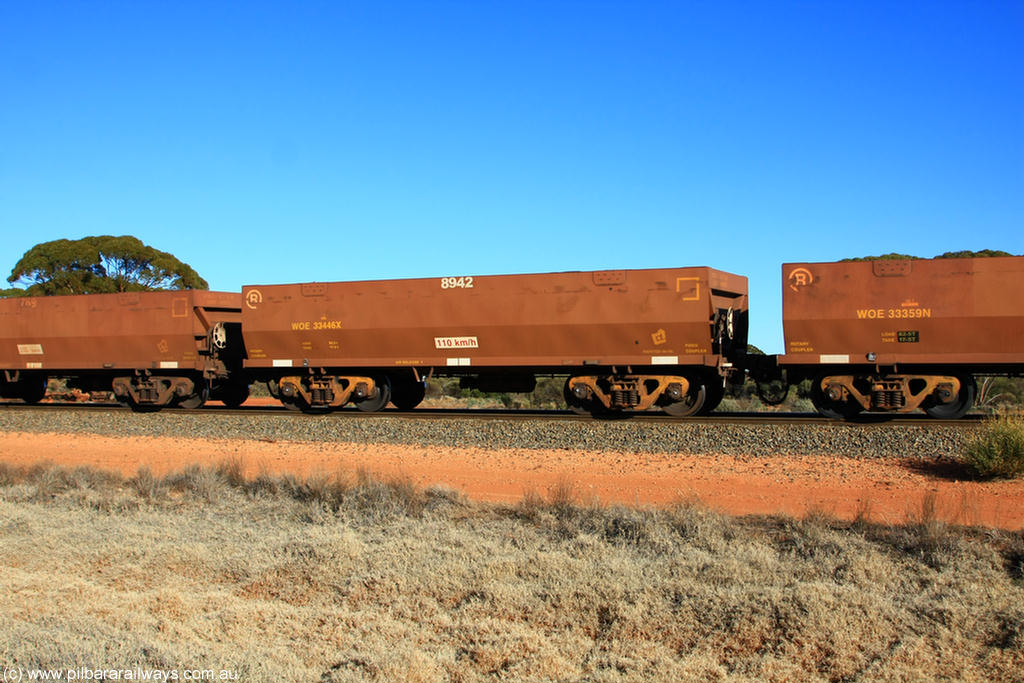 100731 02497
WOE type iron ore waggon WOE 33446 is one of a batch of seventeen built by United Group Rail WA between July and August 2008 with serial number 950209-010 and fleet number 8942 for Koolyanobbing iron ore operations, on empty train 6418 at Binduli Triangle, 31st July 2010.
Keywords: WOE-type;WOE33446;United-Group-Rail-WA;950209-010;