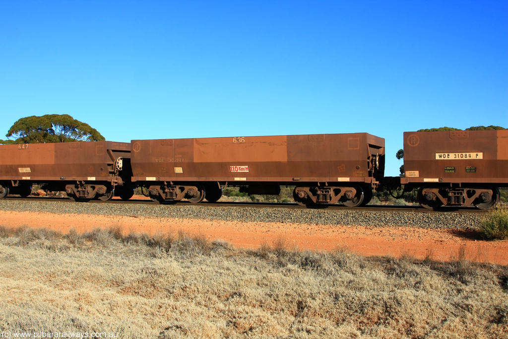 100731 02501
WOE type iron ore waggon WOE 30294 is one of a batch of one hundred and thirty built by Goninan WA between March and August 2001 with serial number 950092-044 and fleet number 636 for Koolyanobbing iron ore operations, on empty train 6418 at Binduli Triangle, 31st July 2010.
Keywords: WOE-type;WOE30294;Goninan-WA;950092-044;