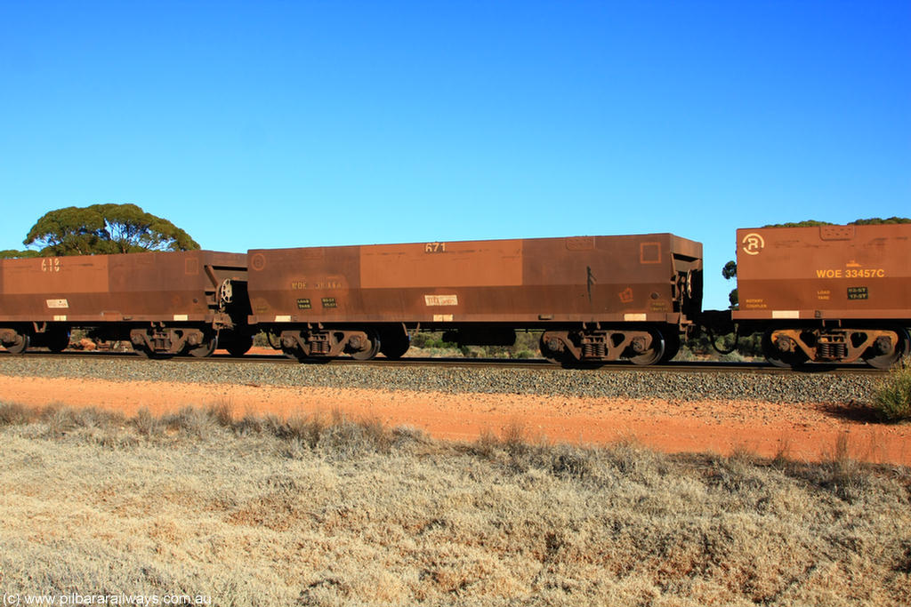 100731 02504
WOE type iron ore waggon WOE 31086 is one of a batch of one hundred and thirty built by Goninan WA between March and August 2001 with serial number 950092-076 and fleet number 671 for Koolyanobbing iron ore operations, on empty train 6418 at Binduli Triangle, 31st July 2010.
Keywords: WOE-type;WOE31086;Goninan-WA;950092-076;
