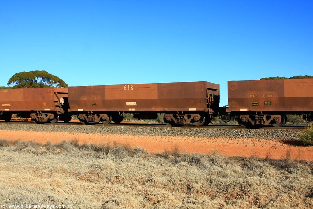 100731 02505
WOE type iron ore waggon WOE 30275 is one of a batch of one hundred and thirty built by Goninan WA between March and August 2001 with serial number 950092-025 and fleet number 618 for Koolyanobbing iron ore operations, on empty train 6418 at Binduli Triangle, 31st July 2010.
Keywords: WOE-type;WOE30275;Goninan-WA;950092-025;