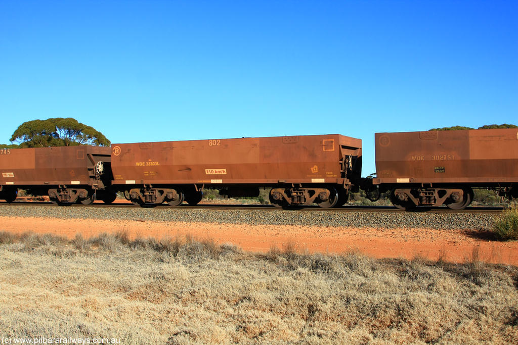 100731 02506
WOE type iron ore waggon WOE 33303 is one of a batch of one hundred and forty one built by United Goninan WA between November 2005 and April 2006 with serial number 950142-008 and fleet number 802 for Koolyanobbing iron ore operations, on empty train 6418 at Binduli Triangle, 31st July 2010.
Keywords: WOE-type;WOE33303;United-Goninan-WA;950142-008;