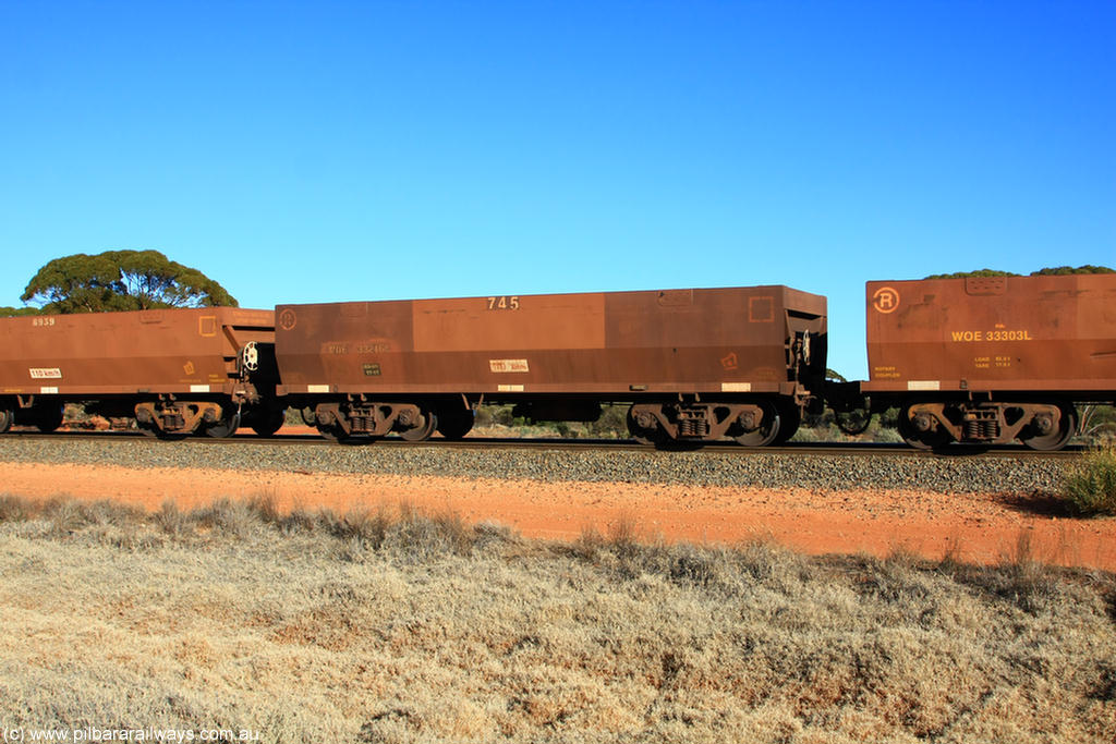 100731 02507
WOE type iron ore waggon WOE 33246 is one of a batch of twenty seven built by Goninan WA between September and October 2002 with serial number and fleet number 745 for Koolyanobbing iron ore operations, on empty train 6418 at Binduli Triangle, 31st July 2010.
Keywords: WOE-type;WOE33246;Goninan-WA;950103-013;