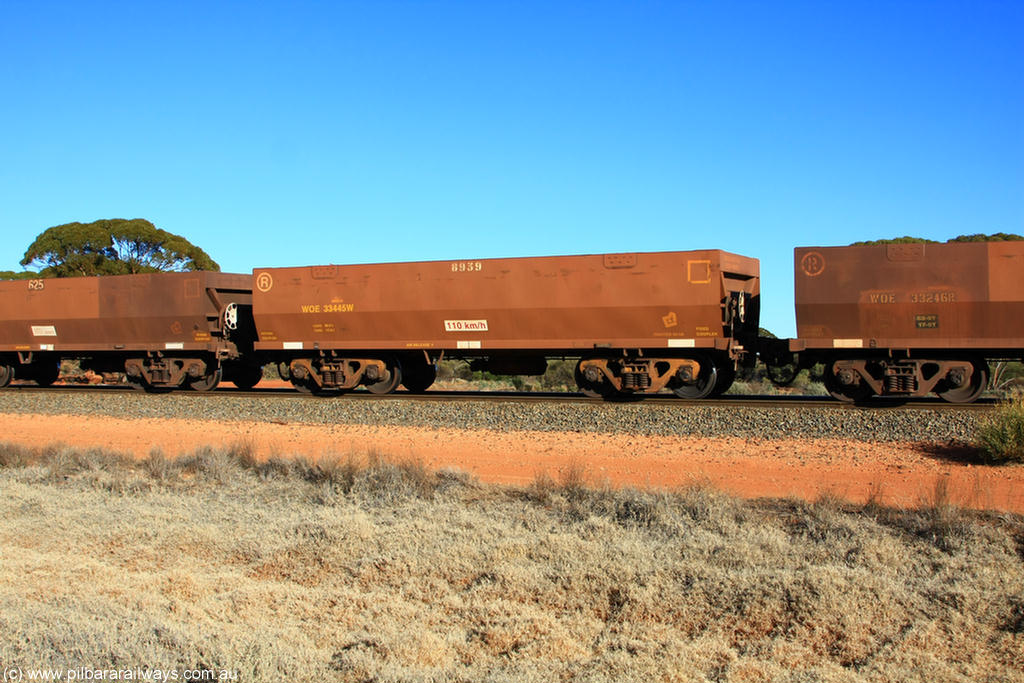 100731 02508
WOE type iron ore waggon WOE 33445 is one of a batch of seventeen built by United Group Rail WA between July and August 2008 with serial number 950209-009 and fleet number 8939 for Koolyanobbing iron ore operations, on empty train 6418 at Binduli Triangle, 31st July 2010.
Keywords: WOE-type;WOE33445;United-Group-Rail-WA;950209-009;