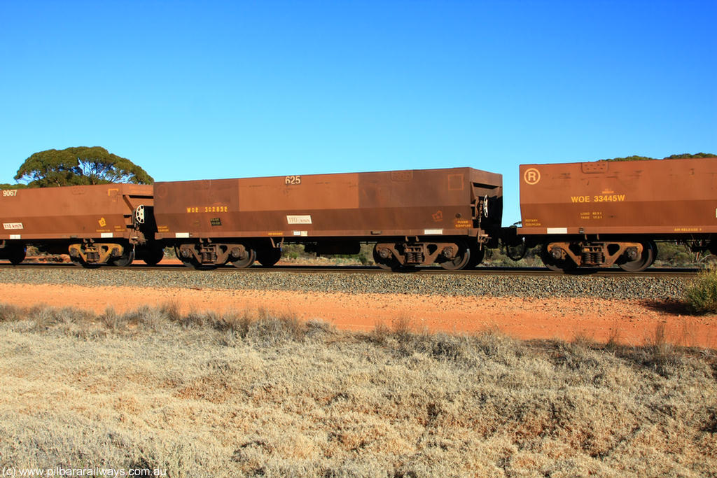 100731 02509
WOE type iron ore waggon WOE 30283 is one of a batch of one hundred and thirty built by Goninan WA between March and August 2001 with serial number 950092-033 and fleet number 625 for Koolyanobbing iron ore operations, on empty train 6418 at Binduli Triangle, 31st July 2010.
Keywords: WOE-type;WOE30283;Goninan-WA;950092-033;