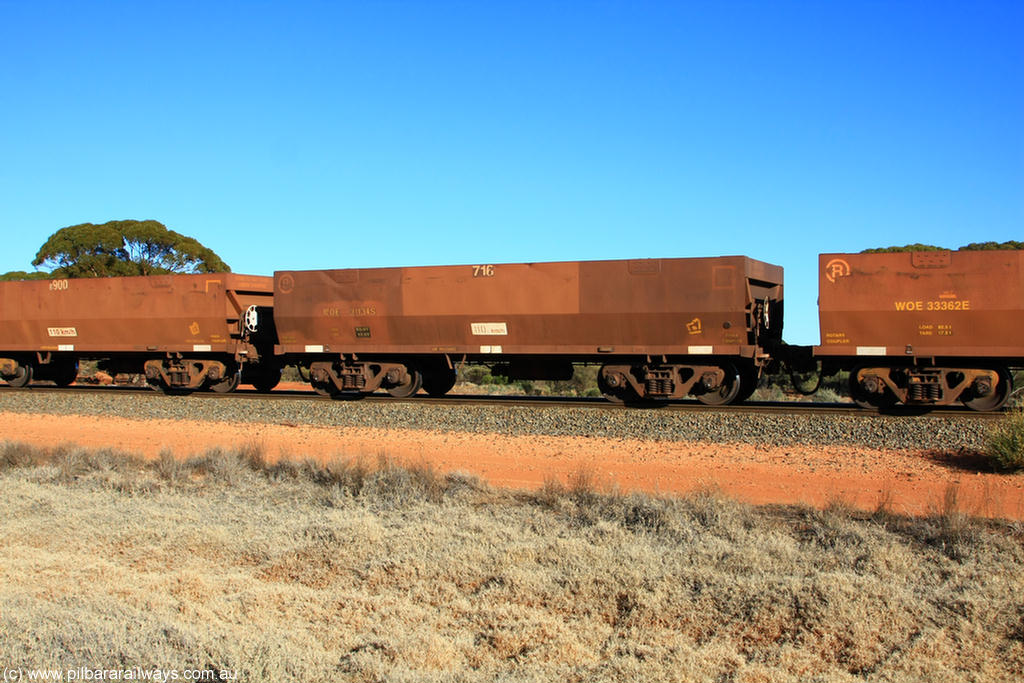 100731 02513
WOE type iron ore waggon WOE 31134 is one of a batch of one hundred and thirty built by Goninan WA between March and August 2001 with serial number 950092-124 and fleet number 716 for Koolyanobbing iron ore operations, on empty train 6418 at Binduli Triangle, 31st July 2010.
Keywords: WOE-type;WOE31134;Goninan-WA;950092-124;