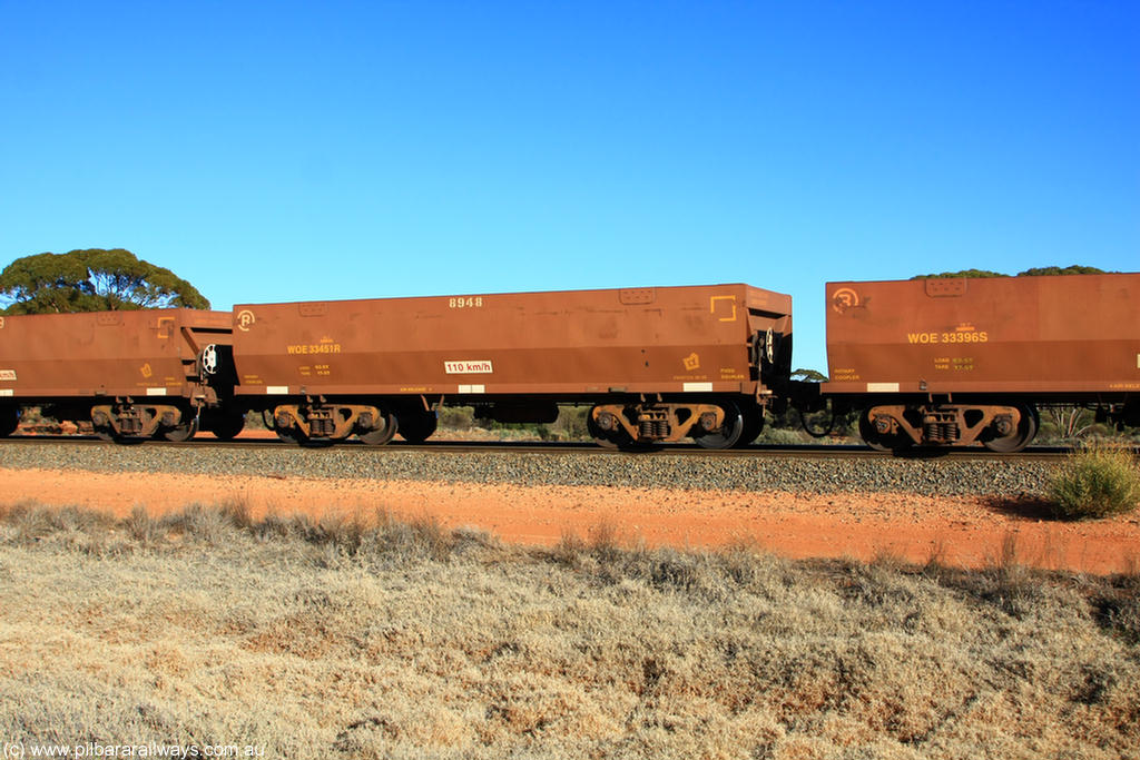 100731 02517
WOE type iron ore waggon WOE 33451 is one of a batch of seventeen built by United Group Rail WA between July and August 2008 with serial number 950209-015 and fleet number 8948 for Koolyanobbing iron ore operations, on empty train 6418 at Binduli Triangle, 31st July 2010.
Keywords: WOE-type;WOE33451;United-Group-Rail-WA;950209-015;