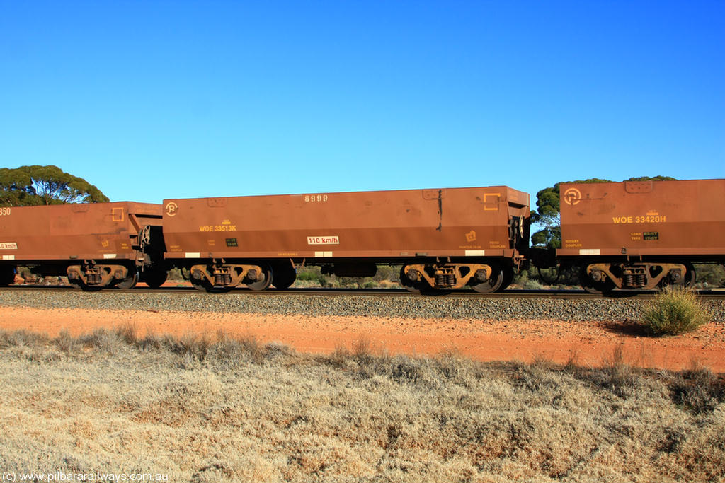 100731 02519
WOE type iron ore waggon WOE 33513 is one of a batch of one hundred and twenty eight built by United Group Rail WA between August 2008 and March 2009 with serial number 950211-053 and fleet number 8999 for Koolyanobbing iron ore operations, on empty train 6418 at Binduli Triangle, 31st July 2010.
Keywords: WOE-type;WOE33513;United-Group-Rail-WA;950211-053;