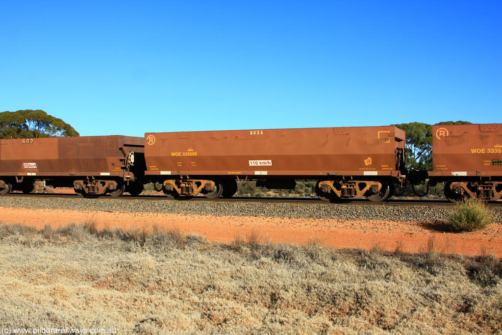 100731 02521
WOE type iron ore waggon WOE 33559 is one of a batch of one hundred and twenty eight built by United Group Rail WA between August 2008 and March 2009 with serial number 950211-099 and fleet number 9054 for Koolyanobbing iron ore operations, on empty train 6418 at Binduli Triangle, 31st July 2010.
Keywords: WOE-type;WOE33559;United-Group-Rail-WA;950211-099;