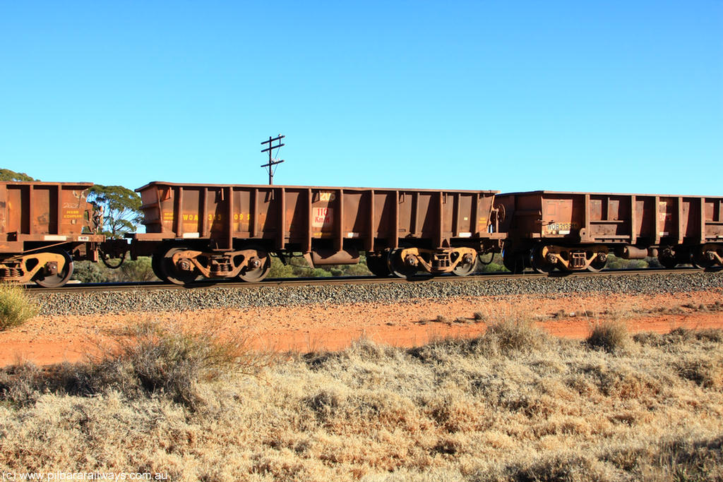 100731 02526
WOA type iron ore waggon WOA 31309 is one of a batch of thirty nine built by WAGR Midland Workshops between 1970 and 1971 with fleet number 205 for Koolyanobbing iron ore operations, with a 75 ton and 1018 ft³ capacity, on empty train 6418 at Binduli Triangle, 31st July 2010.
Keywords: WOA-type;WOA31309;WAGR-Midland-WS;