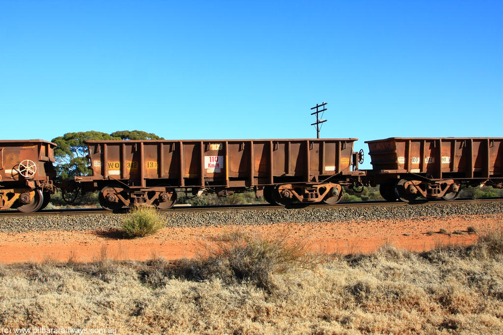 100731 02532
WO type iron ore waggon WO 31213 is one of a batch of eighty six built by WAGR Midland Workshops between 1967 and March 1968 with fleet number 109 for Koolyanobbing iron ore operations, with a 75 ton and 1018 ft³ capacity, on empty train 6418 at Binduli Triangle, 31st July 2010. This unit was converted to WOG for gypsum in late 1980s till 1990 then reclassed to WOS for superphosphate before being re-classed back to WO in 1994.
Keywords: WO-type;WO31213;WAGR-Midland-WS;