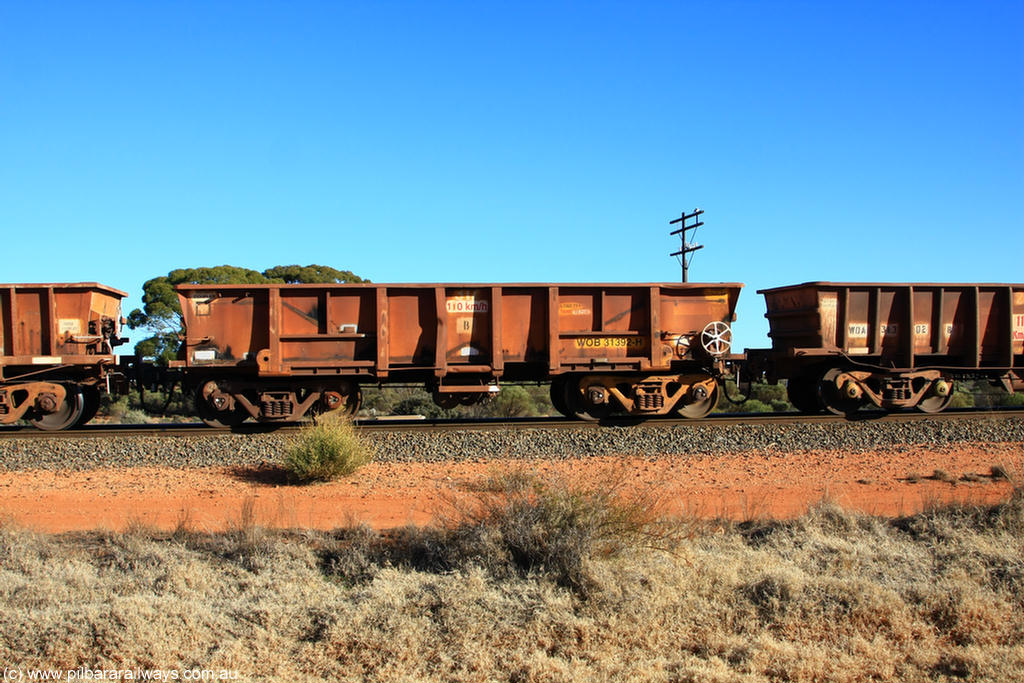 100731 02540
WOB type iron ore waggon WOB 31392 is one of a batch of twenty five built by Comeng WA between 1974 and 1975 and converted from Mt Newman high sided waggons by WAGR Midland Workshops with a capacity of 67 tons with fleet number 317 for Koolyanobbing iron ore operations, this waggon was converted to a WSM ballast hopper, then converted back to a WOB by WAGR Midland Workshops, and started life as a Comeng built Mt Newman Mining ore car in 1974. It was originally numbered 31391 by WAGR, on empty train 6418 at Binduli Triangle, 31st July 2010.
Keywords: WOB-type;WOB31392;Comeng-WA;WSM-type;Mt-Newman-Mining;