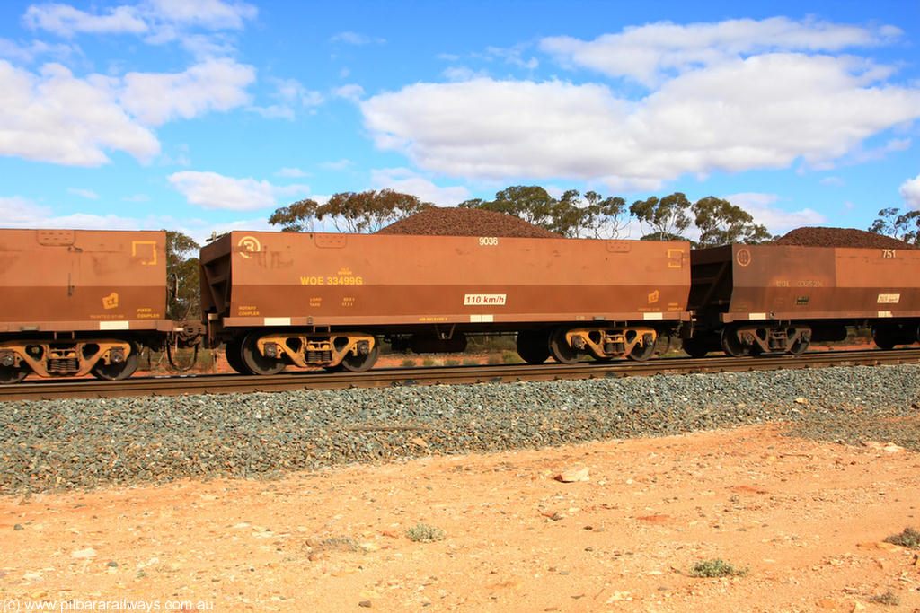 100731 02824
WOE type iron ore waggon WOE 33499 is one of a batch of one hundred and twenty eight built by United Group Rail WA between August 2008 and March 2009 with serial number 950211-039 and fleet number 9036 for Koolyanobbing iron ore operations, on loaded train 7415 at Binduli Triangle, 31st July 2010.
Keywords: WOE-type;WOE33499;United-Group-Rail-WA;950211-039;