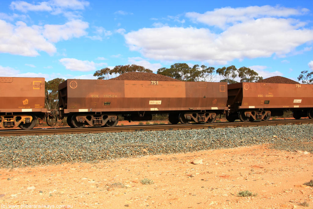 100731 02825
WOE type iron ore waggon WOE 33252 is one of a batch of twenty seven built by Goninan WA between September and October 2002 with serial number 950103-019 and fleet number 751 for Koolyanobbing iron ore operations, on loaded train 7415 at Binduli Triangle, 31st July 2010.
Keywords: WOE-type;WOE33252;Goninan-WA;950103-019;
