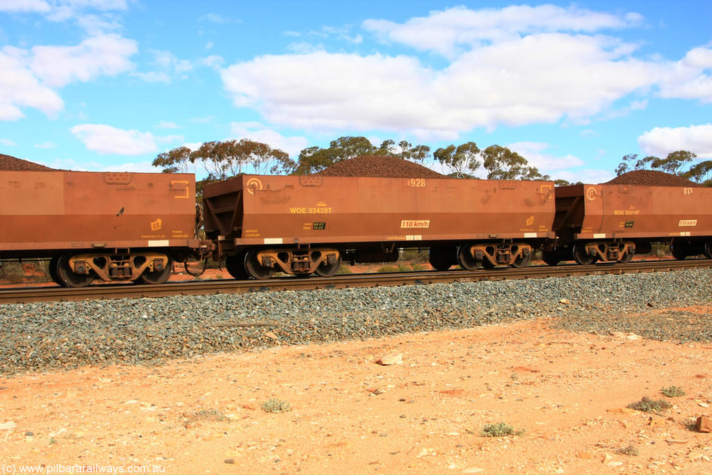 100731 02833
WOE type iron ore waggon WOE 33429 is one of a batch of one hundred and forty one built by United Group Rail WA between November 2005 and April 2006 with serial number 950142-134 and fleet number 8928 for Koolyanobbing iron ore operations, on loaded train 7415 at Binduli Triangle, 31st July 2010.
Keywords: WOE-type;WOE33429;United-Group-Rail-WA;950142-134;