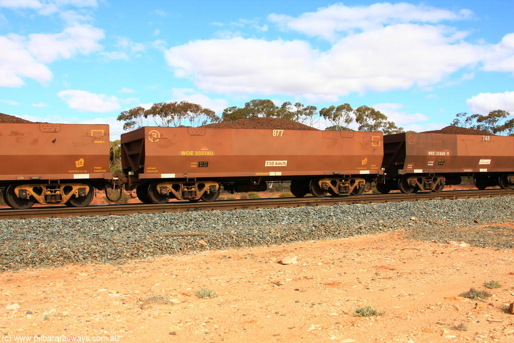 100731 02839
WOE type iron ore waggon WOE 33378 is one of a batch of one hundred and forty one built by United Goninan WA between November 2005 and April 2006 with serial number 950142-083 and fleet number 877 for Koolyanobbing iron ore operations, on loaded train 7415 at Binduli Triangle, 31st July 2010.
Keywords: WOE-type;WOE33378;United-Goninan-WA;950142-083;
