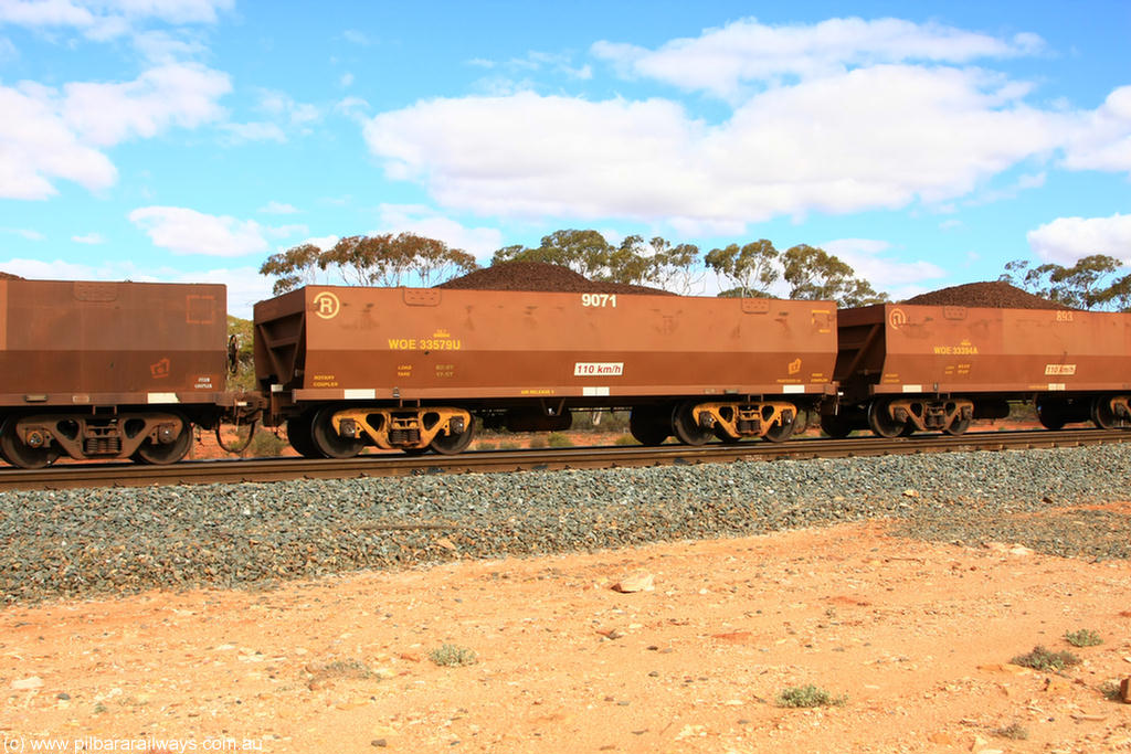 100731 02841
WOE type iron ore waggon WOE 33579 is one of a batch of one hundred and twenty eight built by United Group Rail WA between August 2008 and March 2009 with serial number 950211-104 and fleet number 9071 for Koolyanobbing iron ore operations, on loaded train 7415 at Binduli Triangle, 31st July 2010.
Keywords: WOE-type;WOE33579;United-Group-Rail-WA;950211-104;