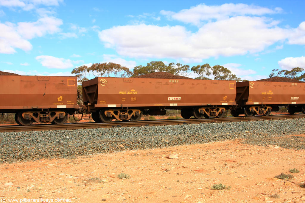 100731 02843
WOE type iron ore waggon WOE 33472 is one of a batch of one hundred and twenty eight built by United Group Rail WA between August 2008 and March 2009 with serial number 950211-014 and fleet number 8972 for Koolyanobbing iron ore operations, on loaded train 7415 at Binduli Triangle, 31st July 2010.
Keywords: WOE-type;WOE33472;United-Group-Rail-WA;950211-014;