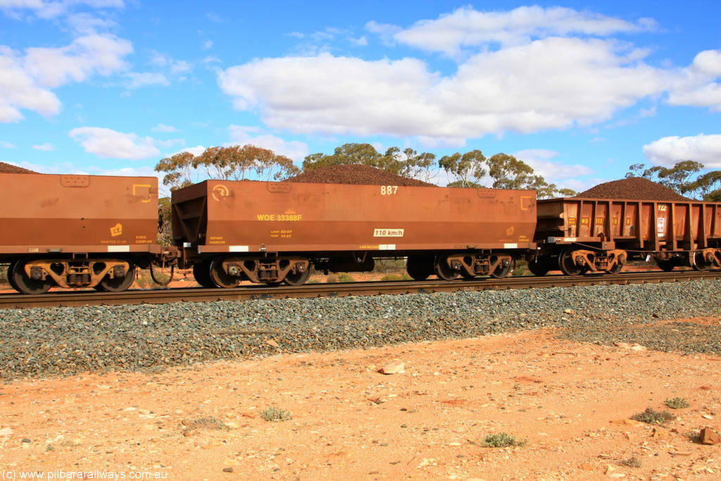 100731 02847
WOE type iron ore waggon WOE 33388 is one of a batch of one hundred and forty one built by United Group Rail WA between November 2005 and April 2006 with serial number 950142-093 and fleet number 887 for Koolyanobbing iron ore operations, on loaded train 7415 at Binduli Triangle, 31st July 2010.
Keywords: WOE-type;WOE33388;United-Group-Rail-WA;950142-093;
