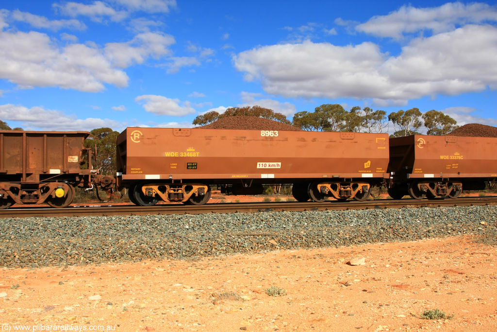 100731 02853
WOE type iron ore waggon WOE 33468 is one of a batch of one hundred and twenty eight built by United Group Rail WA between August 2008 and March 2009 with serial number 950211-010 and fleet number 8963 for Koolyanobbing iron ore operations, on loaded train 7415 at Binduli Triangle, 31st July 2010.
Keywords: WOE-type;WOE33468;United-Group-Rail-WA;950211-010;