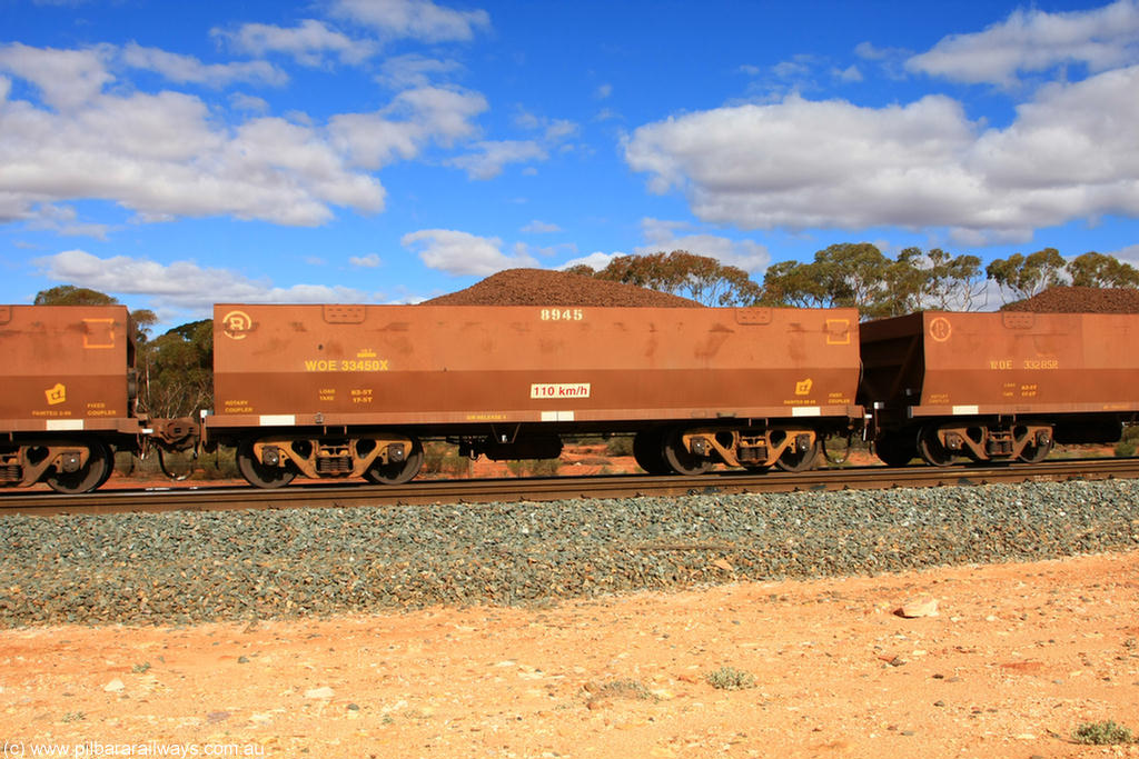 100731 02856
WOE type iron ore waggon WOE 33450 is one of a batch of seventeen built by United Group Rail WA between July and August 2008 with serial number 950209-014 and fleet number 8945 for Koolyanobbing iron ore operations, on loaded train 7415 at Binduli Triangle, 31st July 2010.
Keywords: WOE-type;WOE33450;United-Group-Rail-WA;950209-014;