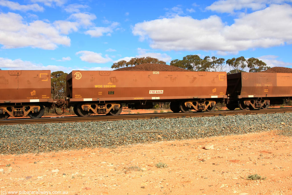 100731 02866
WOE type iron ore waggon WOE 33534 is one of a batch of one hundred and twenty eight built by United Group Rail WA between August 2008 and March 2009 with serial number 950211-074 and fleet number 9026 for Koolyanobbing iron ore operations, on loaded train 7415 at Binduli Triangle, 31st July 2010.
Keywords: WOE-type;WOE33534;United-Group-Rail-WA;950211-074;