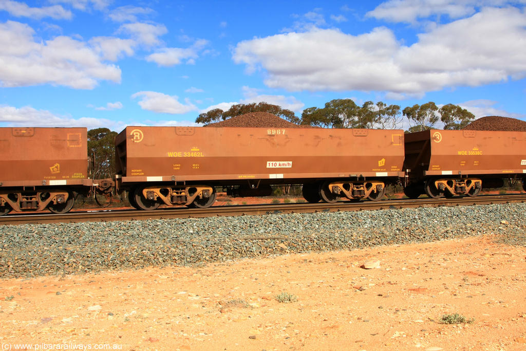 100731 02869
WOE type iron ore waggon WOE 33462 is one of a batch of one hundred and twenty eight built by United Group Rail WA between August 2008 and March 2009 with serial number 950211-004 and fleet number 8967 for Koolyanobbing iron ore operations, on loaded train 7415 at Binduli Triangle, 31st July 2010.
Keywords: WOE-type;WOE33462;United-Group-Rail-WA;950211-004;