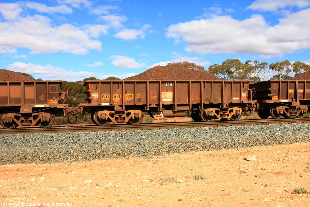 100731 02876
WOA type iron ore waggon WOA 31334 is one of a batch of thirty nine built by WAGR Midland Workshops between 1970 and 1971 with fleet number 214 for Koolyanobbing iron ore operations, with a 75 ton and 1018 ft³ capacity, on loaded train 7415 at Binduli Triangle, 31st July 2010.
Keywords: WOA-type;WOA31334;WAGR-Midland-WS;