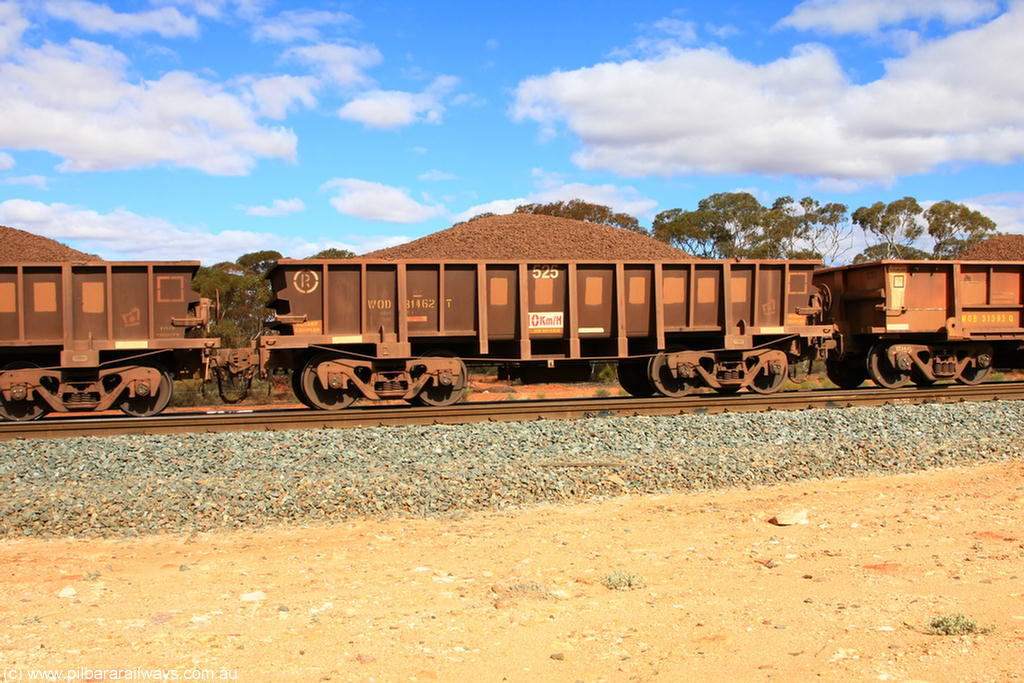 100731 02879
WOD type iron ore waggon WOD 31462 is one of a batch of sixty two built by Goninan WA between April and August 2000 with serial number 950086-034 and fleet number 525 for Koolyanobbing iron ore operations with a 75 ton capacity for Portman Mining to cart their Koolyanobbing iron ore to Esperance, now with PORTMAN painted out, on loaded train 7415 at Binduli Triangle, 31st July 2010.
Keywords: WOD-type;WOD31462;Goninan-WA;950086-034;