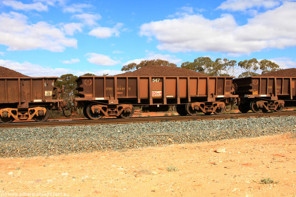 100731 02883
WOD type iron ore waggon WOD 31484 is one of a batch of sixty two built by Goninan WA between April and August 2000 with serial number 950086-056 and fleet number 547 for Koolyanobbing iron ore operations with a 75 ton capacity build date 07/2000, for Portman Mining to cart their Koolyanobbing iron ore to Esperance, now with PORTMAN painted out, on loaded train 7415 at Binduli Triangle, 31st July 2010.
Keywords: WOD-type;WOD31484;Goninan-WA;950086-056;