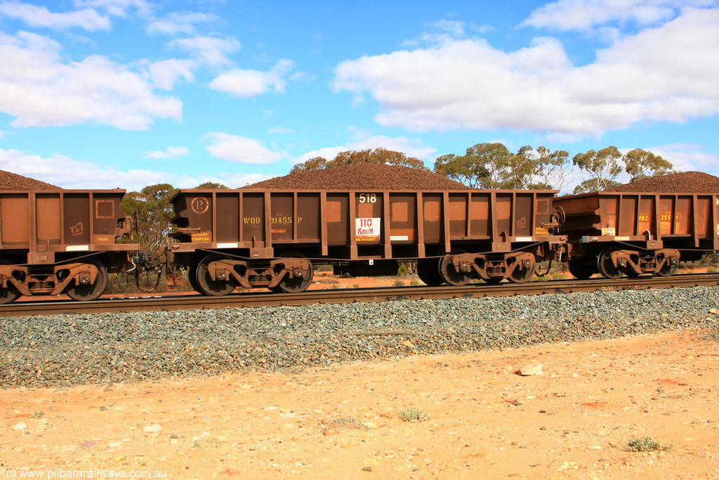100731 02884
WOD type iron ore waggon WOD 31455 is one of a batch of sixty two built by Goninan WA between April and August 2000 with serial number 950086-027 and fleet number 518 for Koolyanobbing iron ore operations with a 75 ton capacity for Portman Mining to cart their Koolyanobbing iron ore to Esperance, now with PORTMAN painted out, on loaded train 7415 at Binduli Triangle, 31st July 2010.
Keywords: WOD-type;WOD31455;Goninan-WA;950086-027;