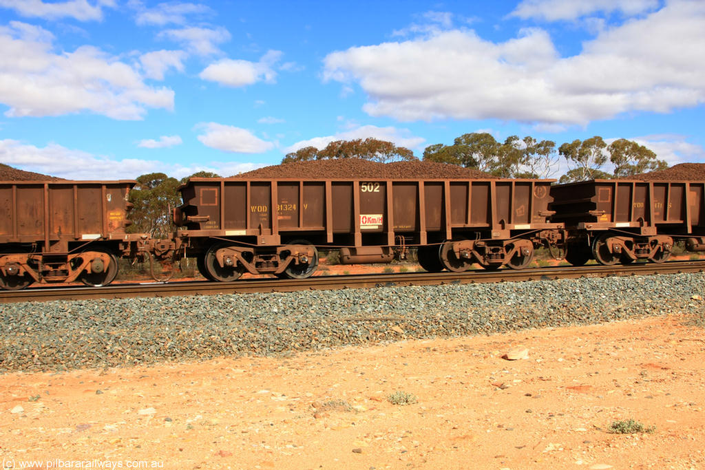 100731 02888
WOD type iron ore waggon WOD 31324 is one of a batch of sixty two built by Goninan WA between April and August 2000 with serial number 950086-012 and fleet number 502 for Koolyanobbing iron ore operations with a 75 ton capacity and a replacement for a WO type waggon number, for Portman Mining to cart their Koolyanobbing iron ore to Esperance, on loaded train 7415 at Binduli Triangle, 31st July 2010.
Keywords: WOD-type;WOD31324;Goninan-WA;950086-012;