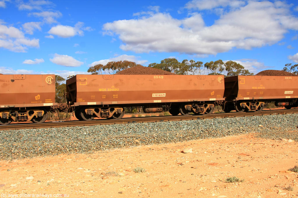 100731 02900
WOE type iron ore waggon WOE 33459 is leader of a batch of one hundred and twenty eight built by United Group Rail WA between August 2008 and March 2009 with serial number 950211-001 and fleet number 8949 for Koolyanobbing iron ore operations, on loaded train 7415 at Binduli Triangle, 31st July 2010.
Keywords: WOE-type;WOE33459;United-Group-Rail-WA;950211-001;