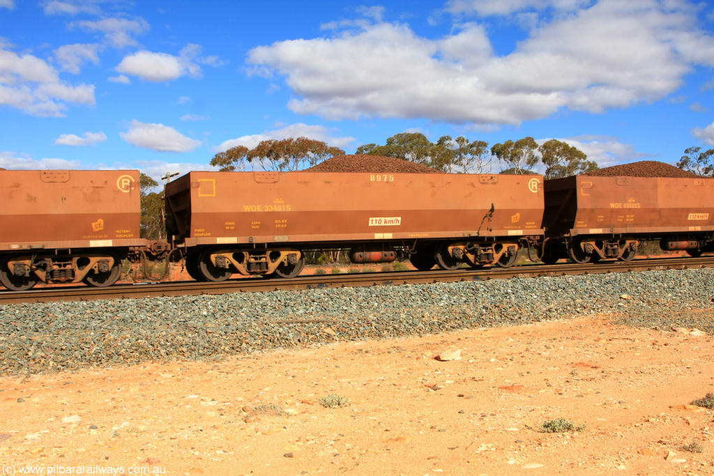 100731 02901
WOE type iron ore waggon WOE 33481 is one of a batch of one hundred and twenty eight built by United Group Rail WA between August 2008 and March 2009 with serial number 950211-023 and fleet number 8975 for Koolyanobbing iron ore operations, on loaded train 7415 at Binduli Triangle, 31st July 2010.
Keywords: WOE-type;WOE33481;United-Group-Rail-WA;950211-023;