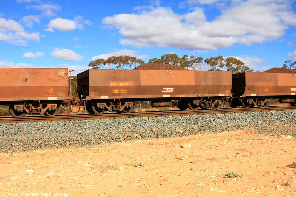 100731 02907
WOE type iron ore waggon WOE 30276 is one of a batch of one hundred and thirty built by Goninan WA between March and August 2001 with serial number 950092-026 and fleet number 619 for Koolyanobbing iron ore operations, on loaded train 7415 at Binduli Triangle, 31st July 2010.
Keywords: WOE-type;WOE30276;Goninan-WA;950092-026;