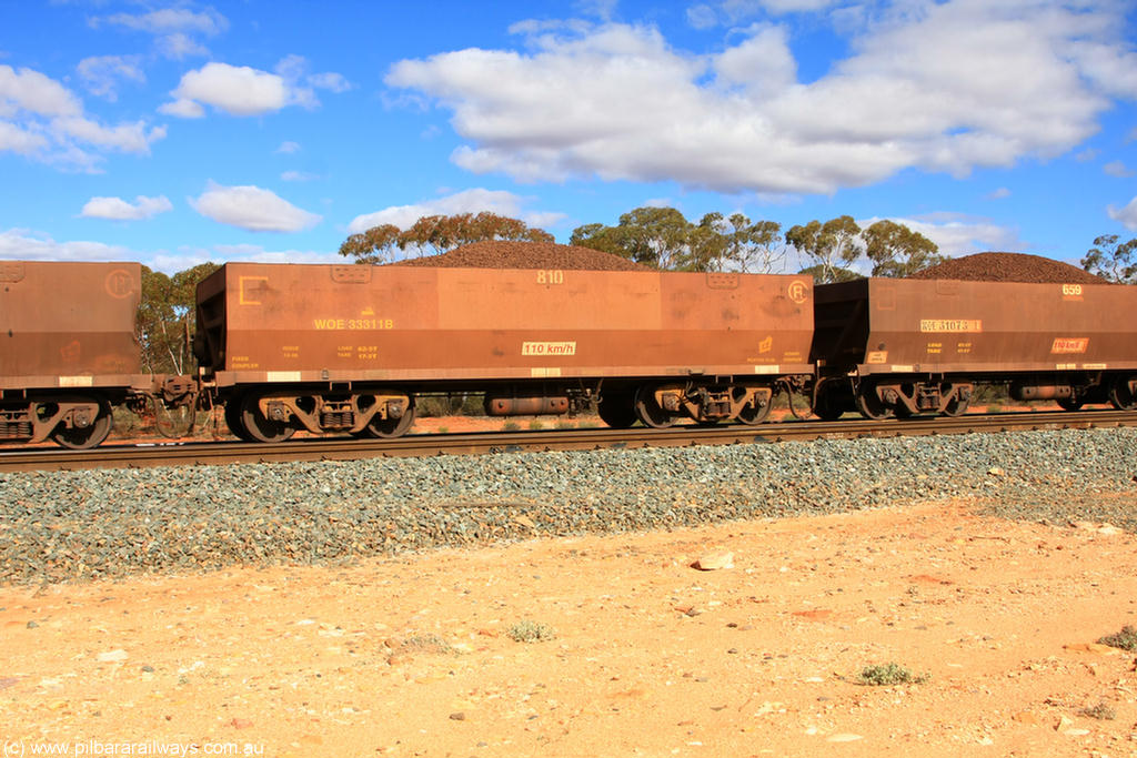 100731 02914
WOE type iron ore waggon WOE 33311 is one of a batch of one hundred and forty one built by United Goninan WA between November 2005 and April 2006 with serial number 950142-016 and fleet number 810 for Koolyanobbing iron ore operations, on loaded train 7415 at Binduli Triangle, 31st July 2010.
Keywords: WOE-type;WOE33311;United-Goninan-WA;950142-016;